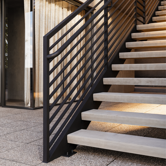 Double stringer exterior steel stair with concrete treads.